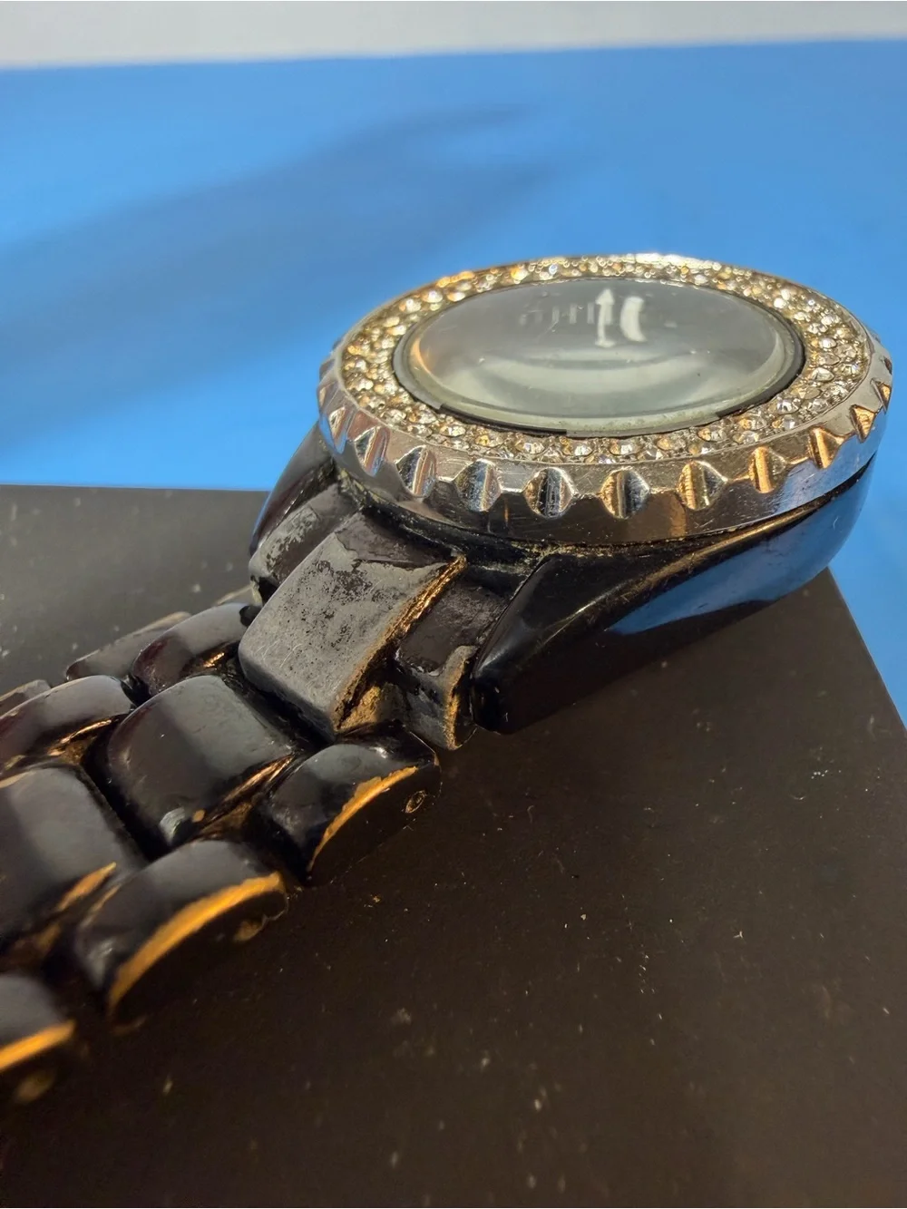 Chanel J12 women's wristwatch with a black ceramic case and bracelet and a bezel